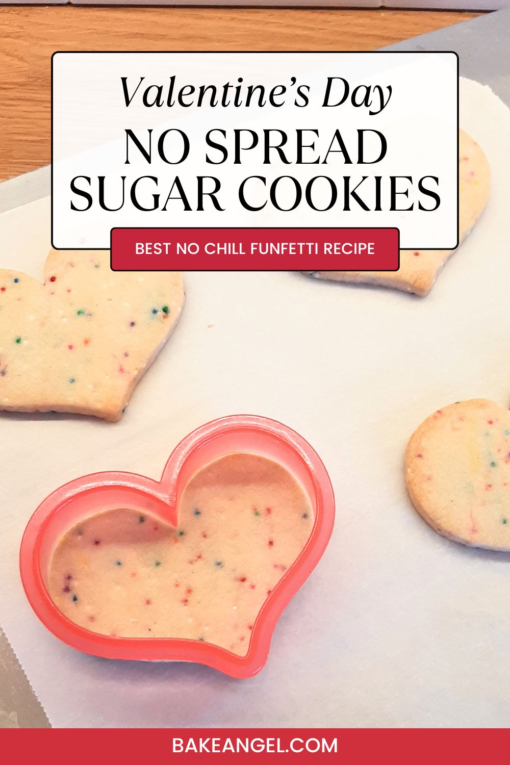 A tray of funfetti no spread sugar cookies, with one cutter on a cookie to show its sharp edges.