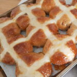Close up of vegan hot cross buns.