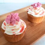 Close up of the cupcakes decorated with a buttercream swirl.