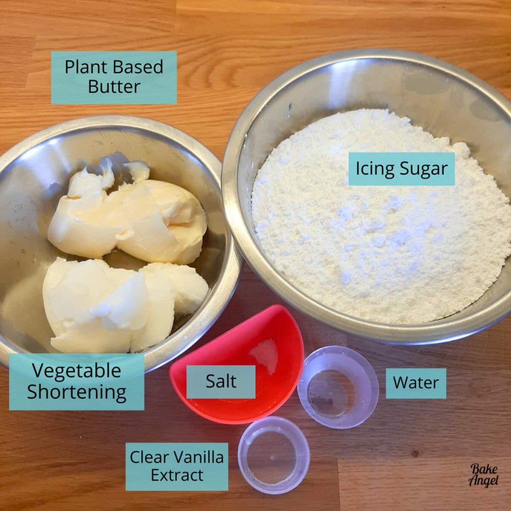 Plant Based Butter, Icing Sugar, Vegetable Shortening, Salt, Water and Clear Vanilla Extract in bowls to make Vegan Stable Vanilla Buttercream.