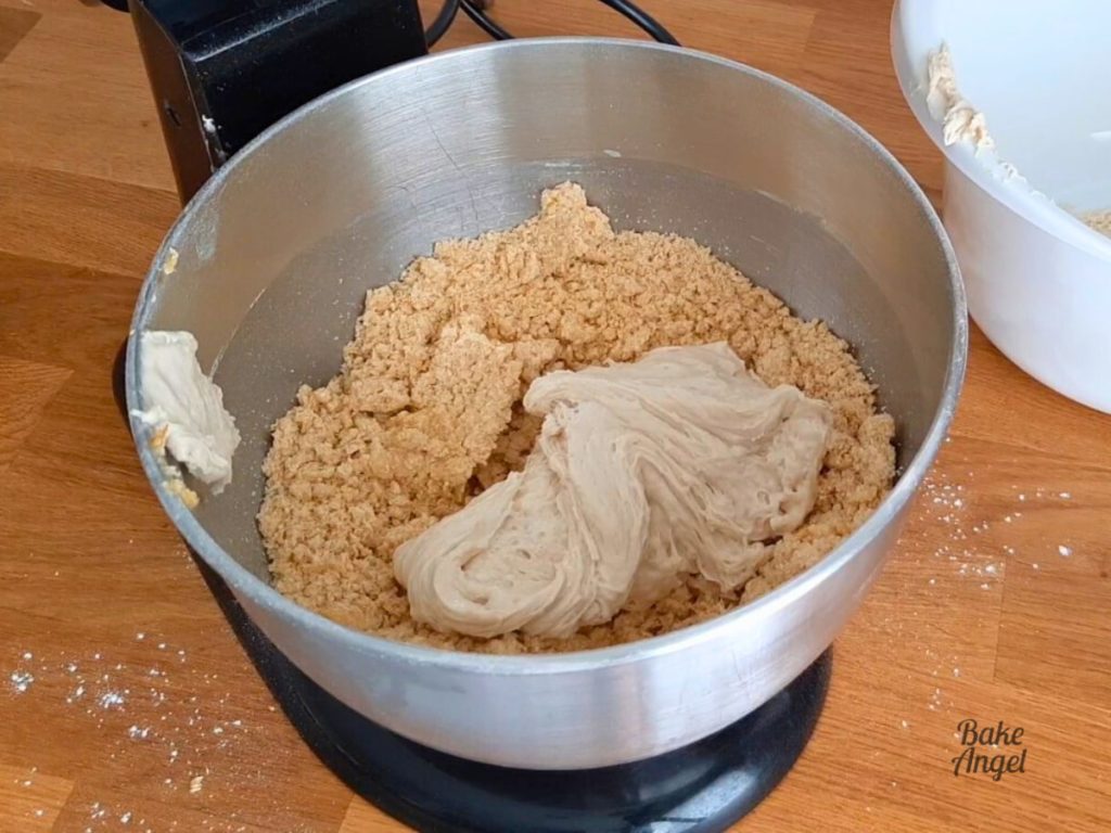 Stollen ingredients in a stand mixer bowl.