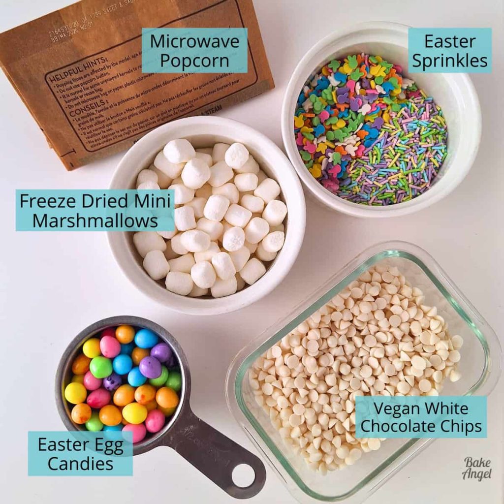 Ingredients laid out in bowls to make a Bunny Bait Easter Popcorn.