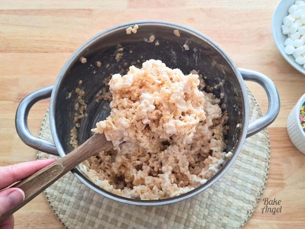 Rice Krispie Treat cereal being stirred.