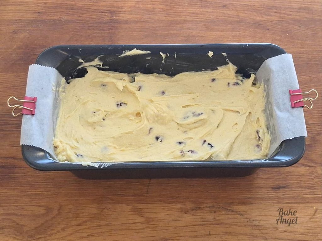 Dairy-Free Lemon Cranberry loaf cake batter in a prepared baking pan, before baking.